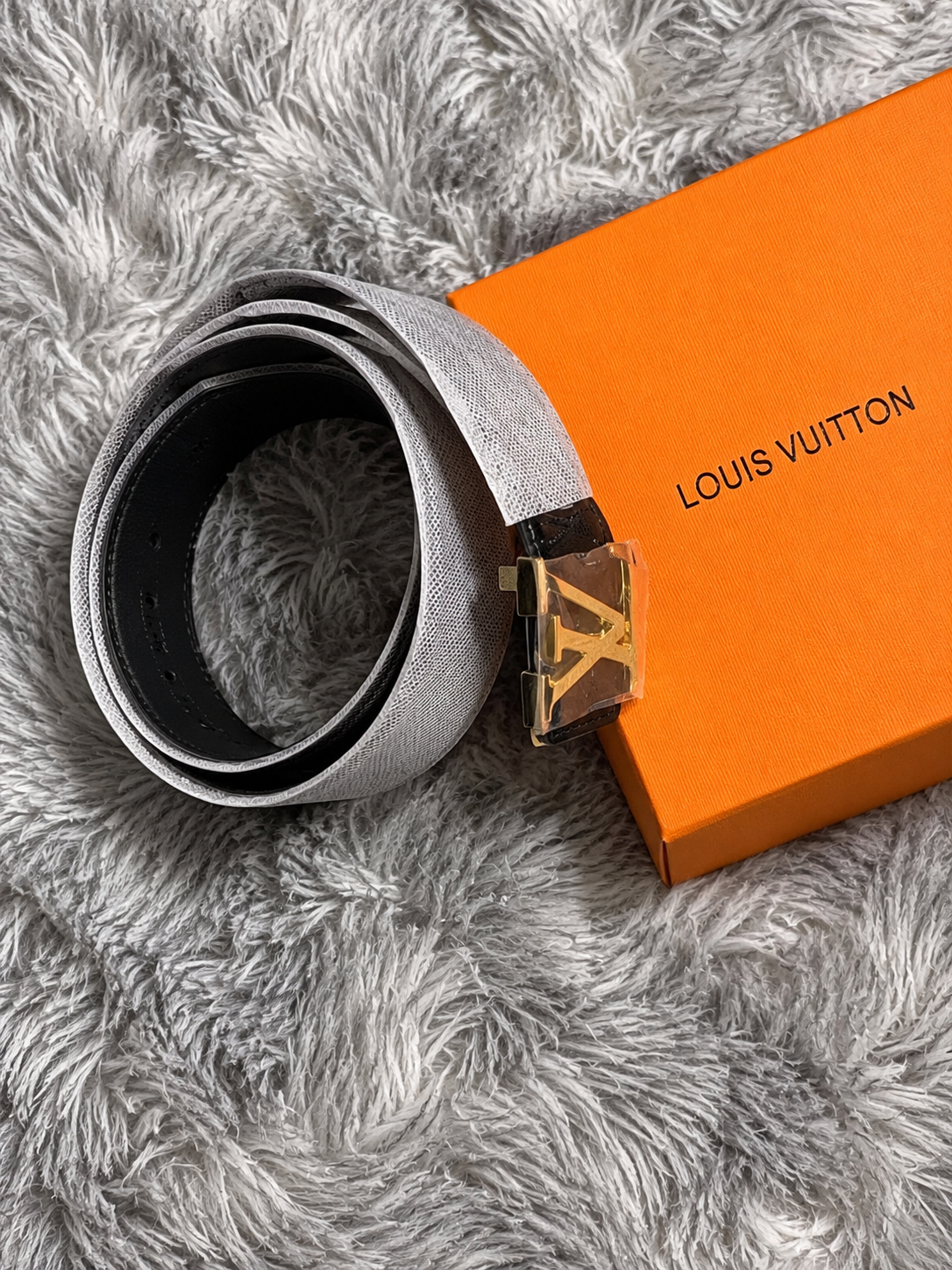 Louis Vuitton–branded statement belt