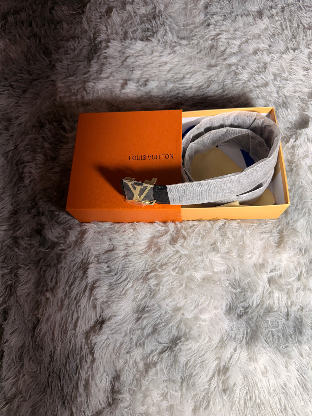 Louis Vuitton–branded statement belt